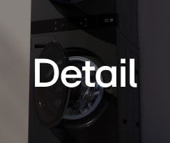 Style text over a dimmed image of LG WashTower built in the living room