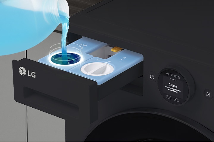 The detergent compartment is open, and the detergent is being poured into the auto dose dispenser.