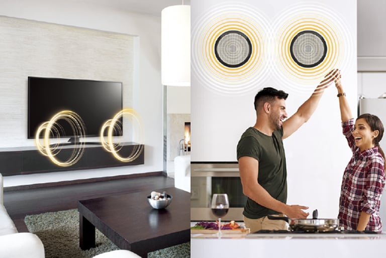 A TV is making sounds in one space, and a man and a woman are listening the sound of TV through external speakers in another space in a hotel room.