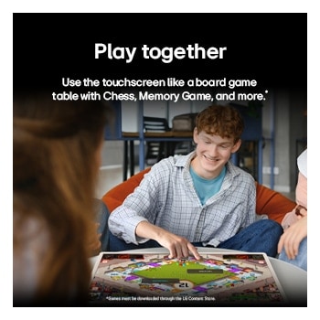 A group of friends playing a board game on the LG StanbyME 2 on the table. The Big Tablet Screen is featured. Text talks about playing directly on the touchscreen.