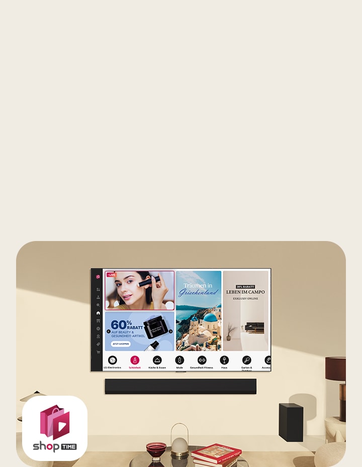 A couple looks at the home shopping channels on a large wall-mounted LG TV in a modern living space.