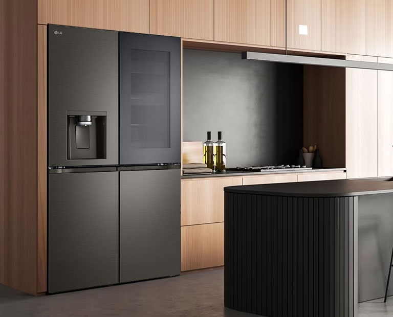 Modern kitchen interior with InstaView fridge.