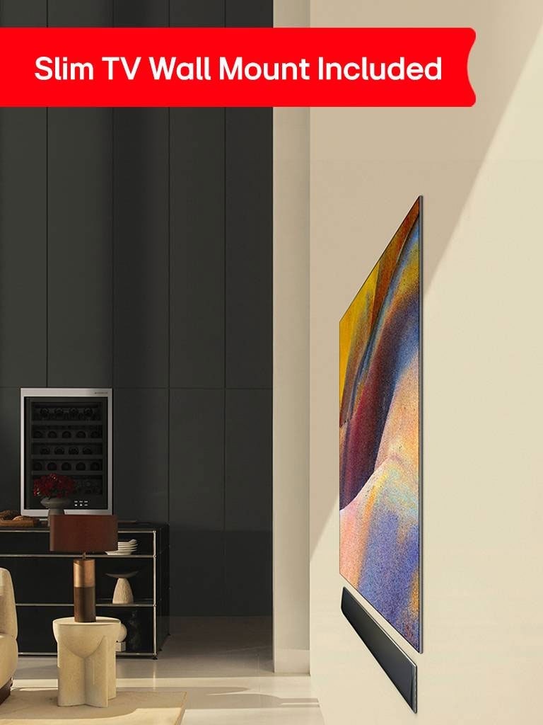 A side view of the LG OLED G4 displaying an elegant abstract artwork and LG Soundbar flat against the wall in a modern living space.