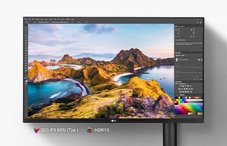 Ultrafine monitor with display showing visual editing software on screen