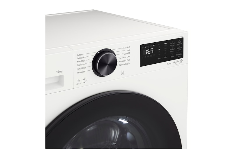 LG Series 3 Front Load Washing Machine right angled close up with door open showing stainless steel drum interior