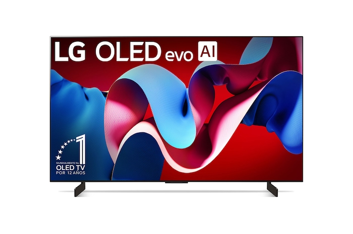 Vista lateral ligeramente inclinada hacia la derecha con la barra de sonido debajo y un altavoz adicional al costado