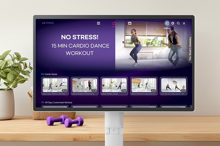 The LG Smart Monitor Swing screen is showing various LG Fitness videos.