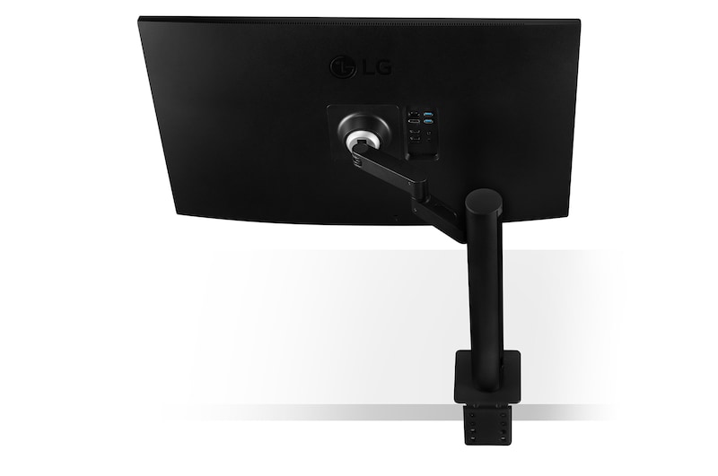 vista trasera con el brazo del monitor extendido hacia la derecha.