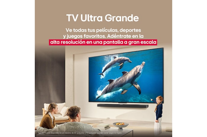 LG TV con una pantalla impresionantemente grande montada en una pared encima de una LG Soundbar en una sala de estar de estilo moderno.