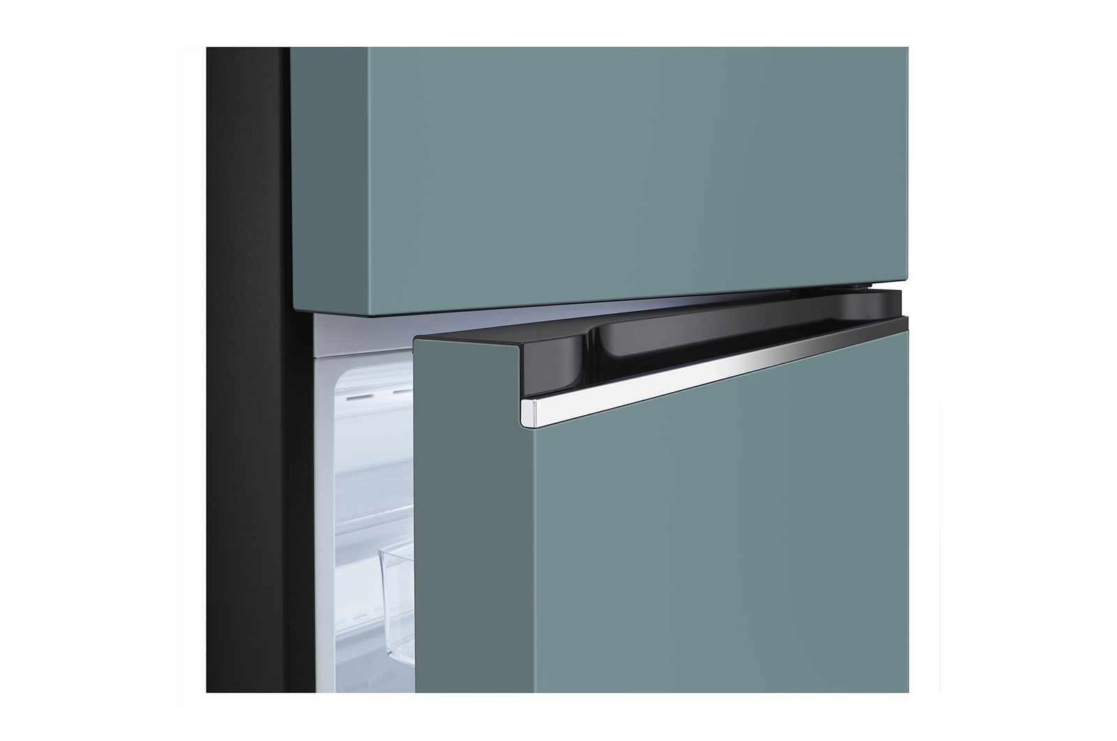 detail view of bottom fridge handle