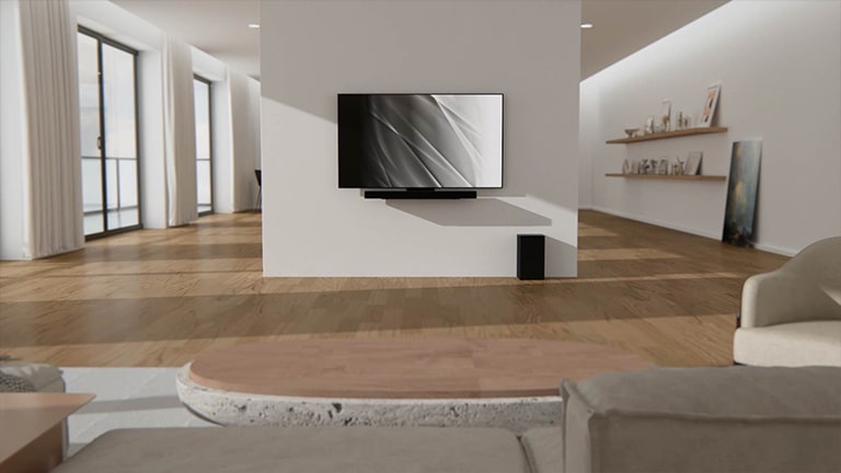Un video se abre con el soporte de sinergia atornillado en la parte posterior de LG OLED C3. El televisor se conecta a la perfección a la pared de un espacio luminoso y moderno.