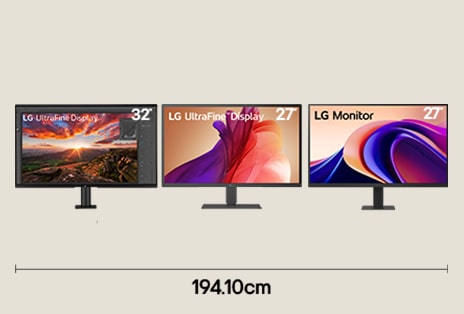 Triple monitor setup with 32 inch UHD, 27 inch 4K, and 27 inch QHD displays for advanced development workflow with 194.10 cm desk width