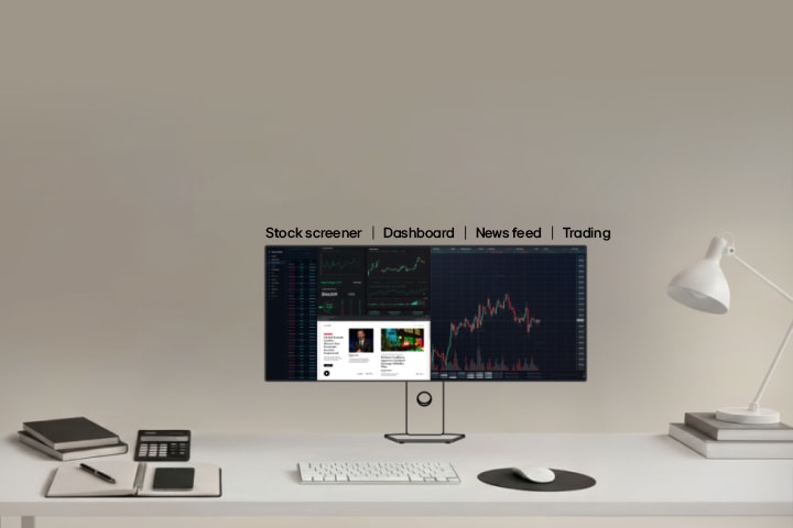 This video shows a multi screen trading setup for financial analysts and traders, where the main monitor displays real time market charts, while secondary monitors show financial data, news feeds, and analytics dashboards to support complex trading and market analysis workflow.