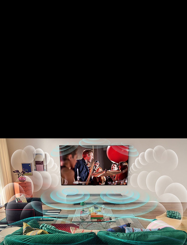 Imagen de una televisión LG OLED en una sala en la que se proyecta un concierto de música. Las burbujas que representan el sonido envolvente virtual llenan el espacio.