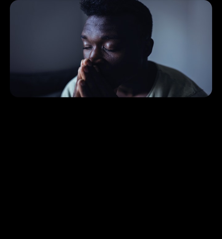 Multi-colored graphics scroll diagonally across the close-up image of a man, and the image colors become cool-toned.