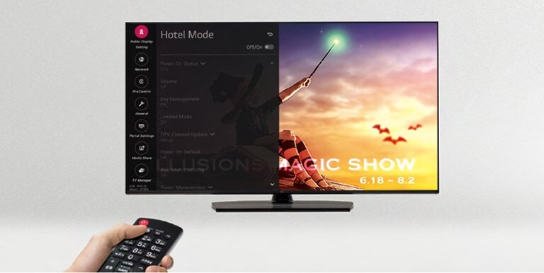 A person is controlling the TV settings with Hotel Mode.