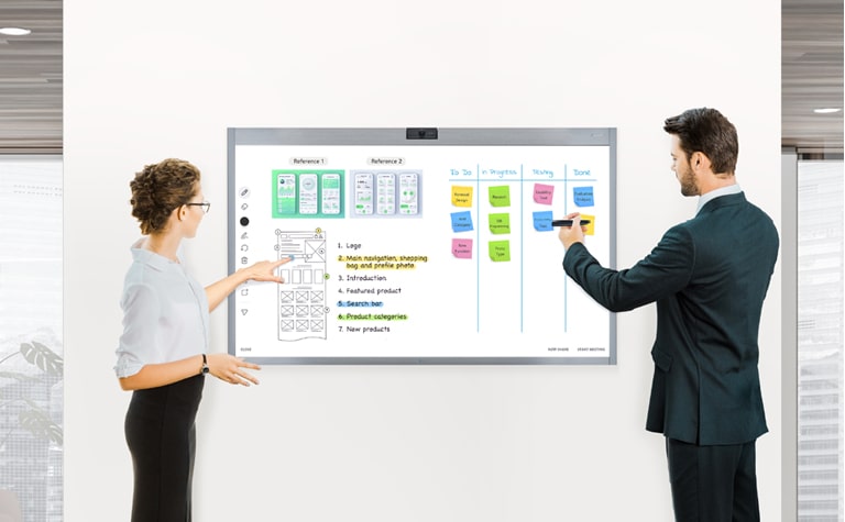 Two employees are sharing their ideas by touching the screen or taking notes on the screen.