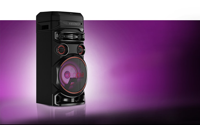 A low angle view of the left side of LG XBOOM against a purple background. The XBOOM light are also purple.