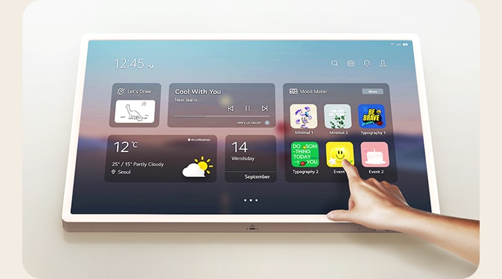 StanbyME 2 with touchscreen in use by a person.
