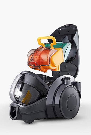 The lid of the vacuum cleaner is open and you can see the filter attached inside.
