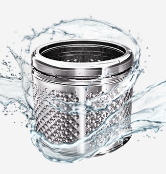 Washing drum with water splashes, showing tub cleaning.