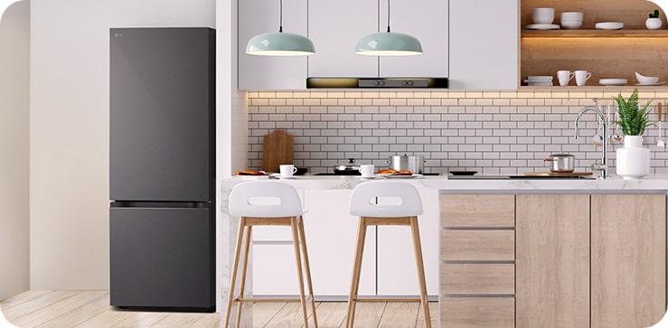 The overall view of  lg bottom freezer refrigerator with water dispenser in a kitchen.