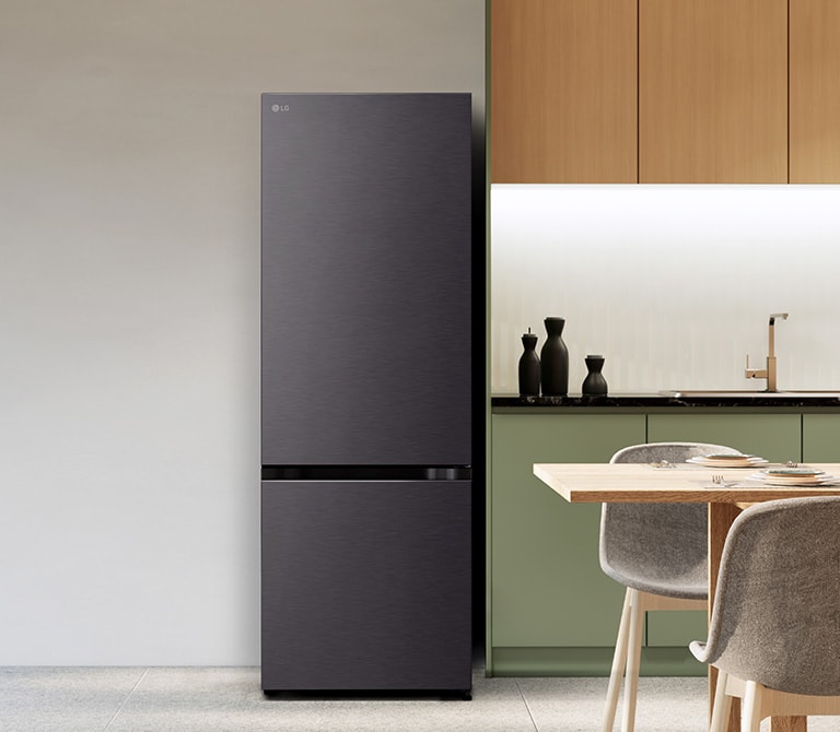 lg bottom freezer refrigerator with water dispenser in a modern kitchen.