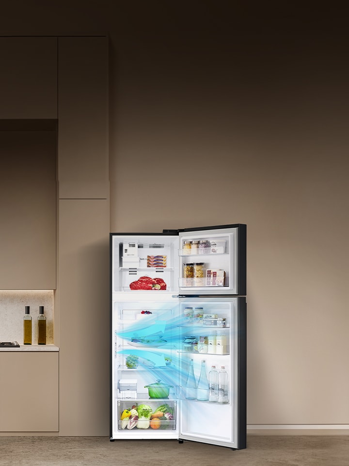 an open LG top freezer refrigerator stocked with various food item showing how the doorcooling feature works.