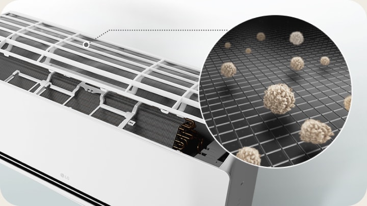 LG air conditioner with open panel showing a pre-filter capturing dust particles in a close-up view.