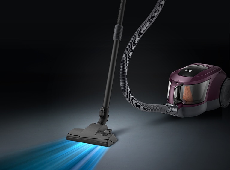 Image of vacuum with blue light indicating suction