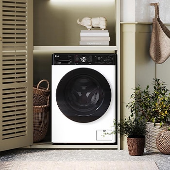 Nowoczesna pralka LG F4W1175YW wkomponowana w jasne, domowe wnętrze, prezentująca elegancki front i funkcjonalny design ułatwiający codzienne pranie.