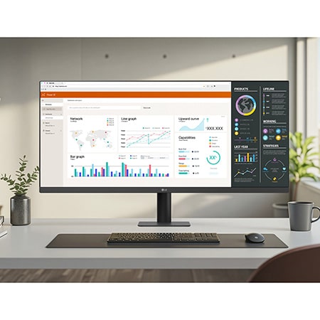 Monitor LG 29U511A w nowoczesnej konfiguracji biura domowego z jasnymi oknami, prezentujący swój wyświetlacz 21:9 UltraWide z pulpitami danych do wielozadaniowości.