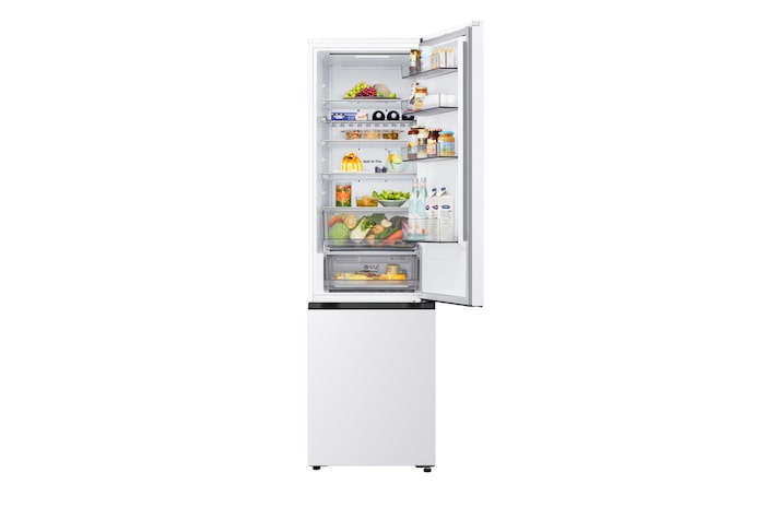 LG bottom freezer (gbbs726cpy) installed flush in tall warm beige wall with white arrows pointing to top side and front surfaces