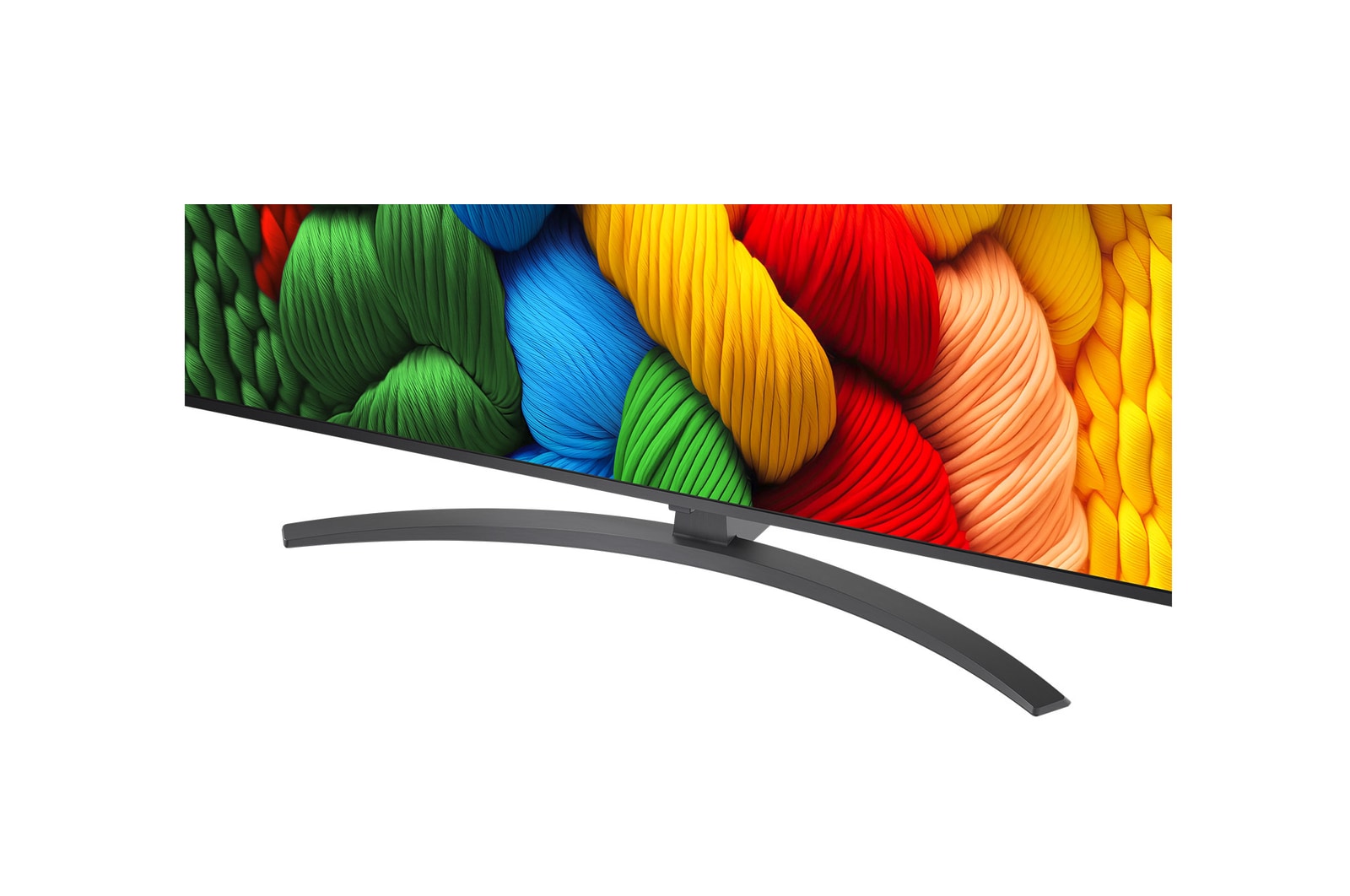 LG TV com um ecrã surpreendentemente grande montada numa parede por cima de uma LG Soundbar numa sala moderna.
