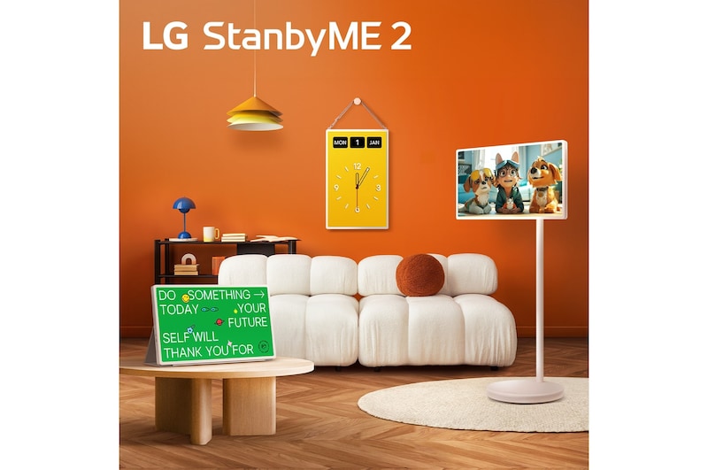 LG StanbyME 2 screens displayed in a modern living room. There is a StanbyME 2 on a stand, one is hung on the wall, and the other is propped up on a table using the folio cover.