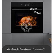 InstaView_There is a pictogram on the door that expresses the knock, and the inside of the oven is lit up.