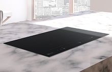 Placa de indução LG instalada.