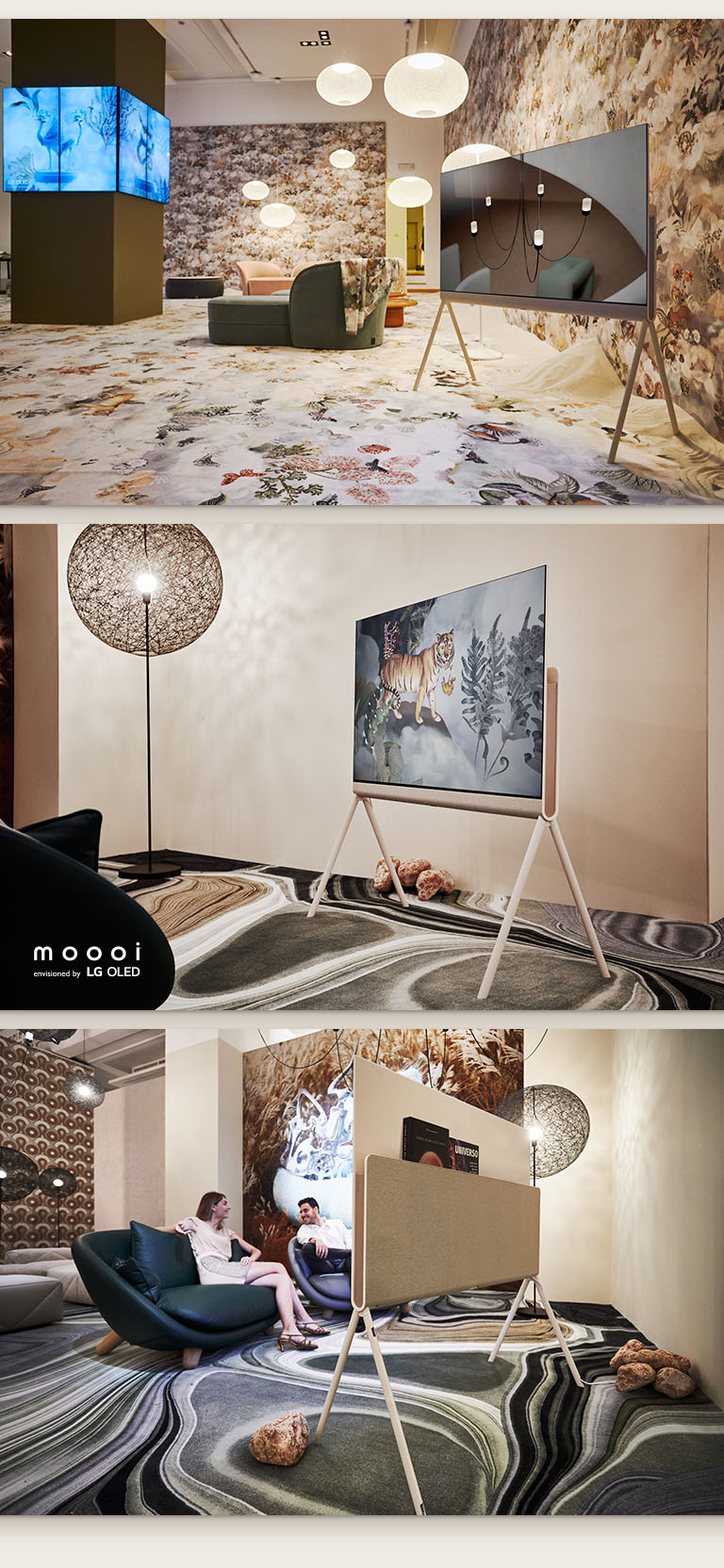 O Posé visto como parte da coleção Divine Dreams da Moooi com uma imagem de um interior moderno no ecrã e rodeado por uma decoração de borboletas e flores que espreitam através das nuvens. O Posé visto de frente como parte da coleção Defy Gravity da Moooi com uma obra artística de um tigre no ecrã e por cima um tapete a imitar camadas de pedra. O Posé visto de trás como parte da Coleção Defy Gravity da Moooi com livros com temas espaciais mantidos no seu organizador de cabos e acessórios. Mooi idealizado pelo logótipo da LG OLED.