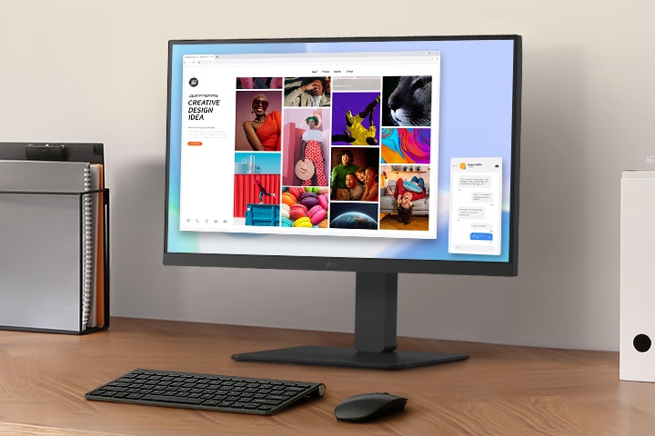 Um espaço de trabalho numa secretária com um monitor e um suporte para documentos.