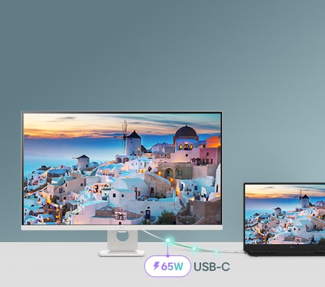 Uma fotografia que mostra um monitor inteligente ligado a um computador portátil através de USB-C, demonstrando o carregamento e a transferência de dados.	