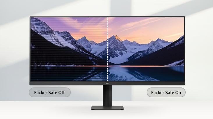 Monitor LG ultralargo que apresenta uma comparação em ecrã dividido de uma paisagem montanhosa, com o lado esquerdo a mostrar a cintilação do ecrã e o lado direito a mostrar uma imagem nítida e sem cintilação