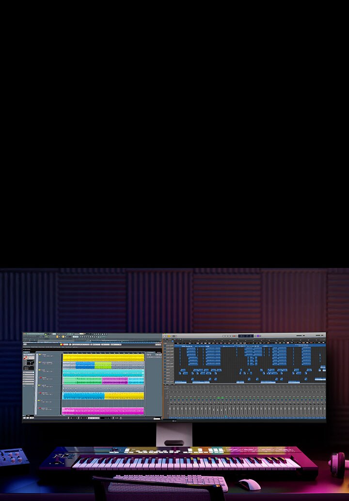 Configuração de produção musical com o LG UltraWide Monitor a apresentar faixas de áudio em camadas e uma linha de tempo completa do projeto.