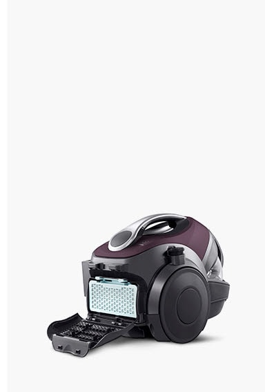 هذه صورة لغطاء الفلتر في الجزء الخلفي من جسم المكنسة الكهربائية وهو مفتوح.