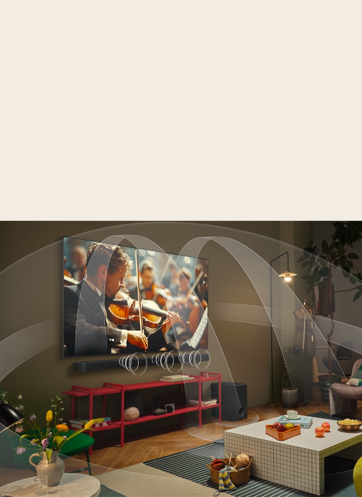 Living room with an LG OLED TV and LG Soundbar with graphics representing how both devices fill the space with multi-surround sound.