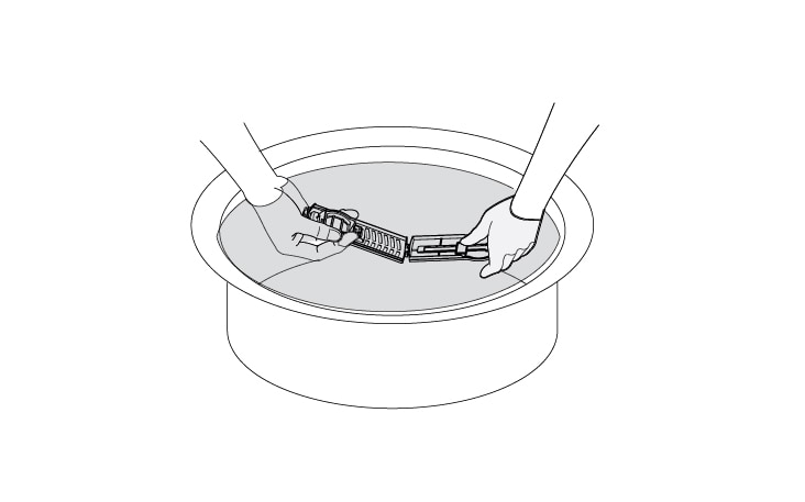 Open the lid and remove the lint and then wash it out.