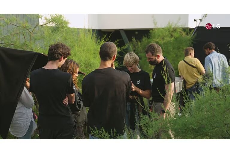 People gathered in the grass