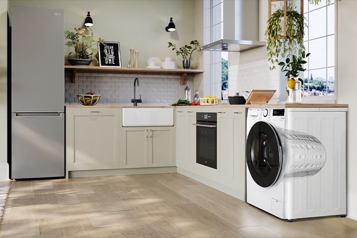 This is the angle that shows the side of the washing machine in the kitchen. The inside of the washing machine is seen through, and the drum is getting bigger.