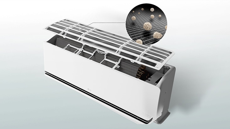 LG air conditioner with open panel showing a pre-filter capturing dust particles in a close-up view.	