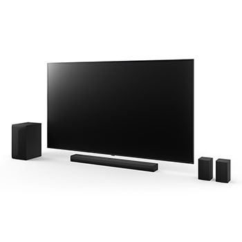 Angled view of 75inch LG QNED, LG Soundbar S75TR, Rear Speakers, and subwoofer