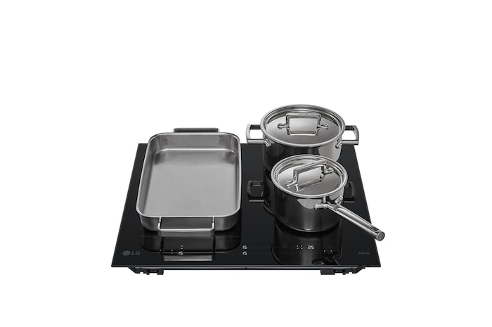 Top view of Induction Cooktop with utensils